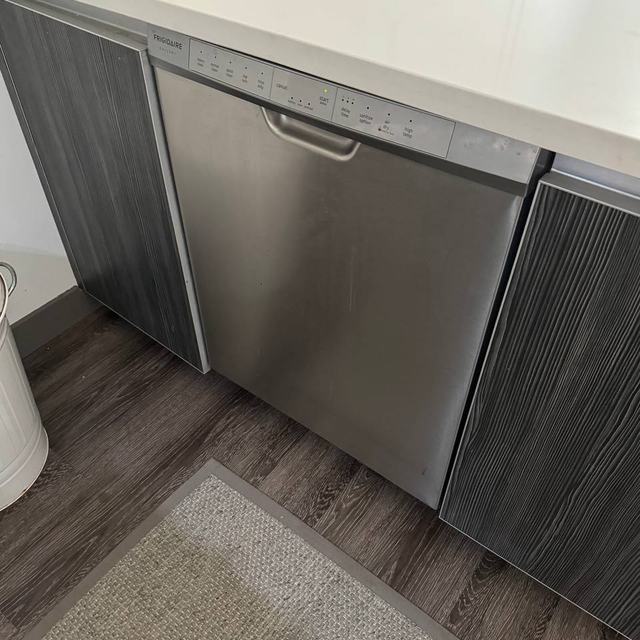 Frigidaire Gallery dishwasher back in place after a drain repair