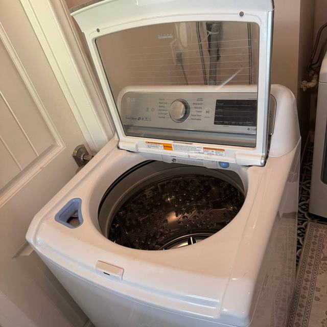 Top-load LG opened up for a drum and pump check after a no-drain call